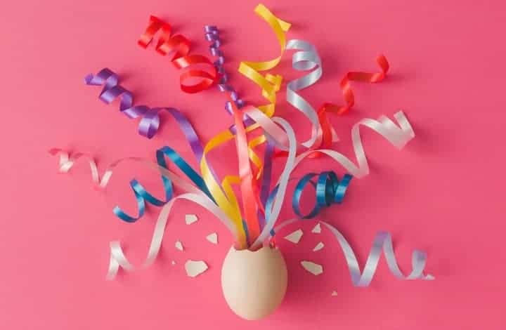 An Easter Egg that has curled ribbon popping out of the top - Awesome Easter Egg Fillers. 