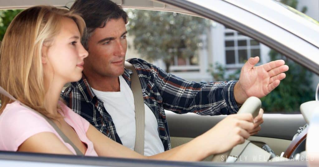Father teaching daughter to drive on a daddy-daughter date. 