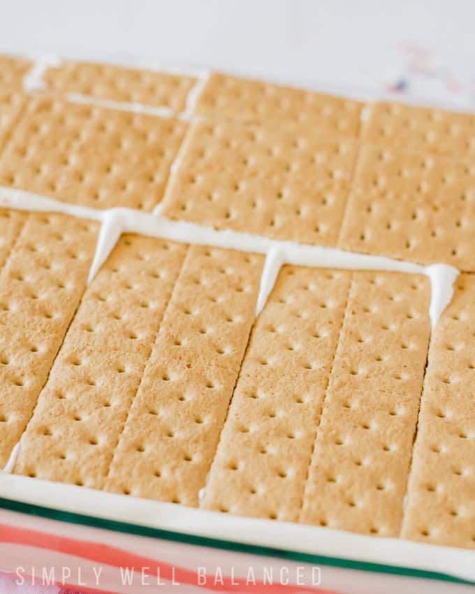 A layer of graham crackers on top of cool whip to make the American flag icebox cake. 